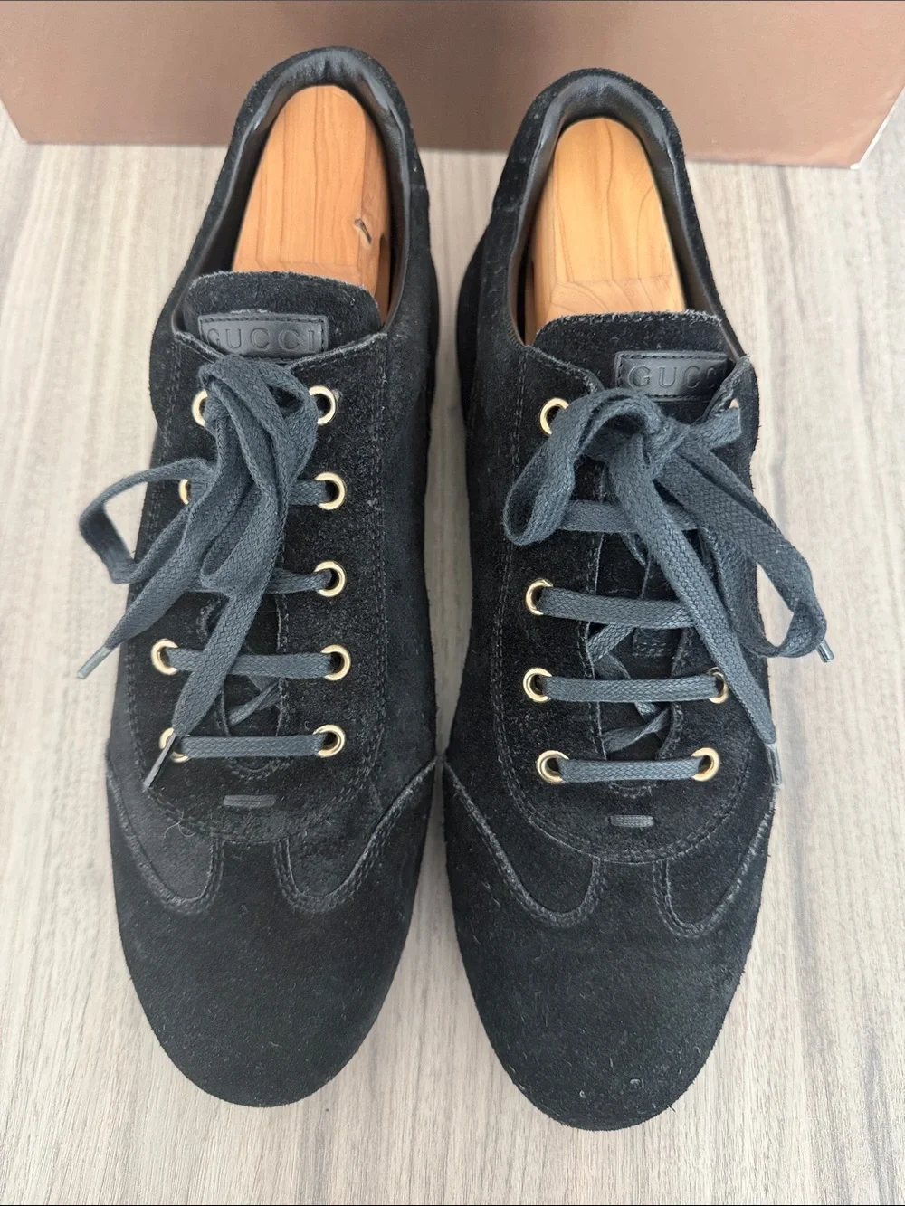 Gucci Men's Black Suede Sneakers with Gold Eyelets